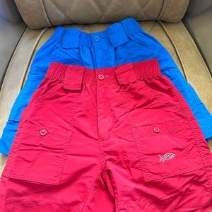 Boys AFTCO fishing shorts size 10-12, size 26, blue and red shorts.